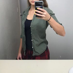 Green button up shirt